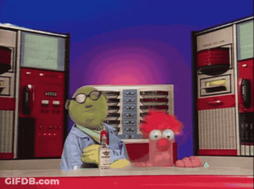 A Cartoon Character Holding A Bottle Of Beaker 'S Liquor Stands Next To Another Cartoon Character GIF