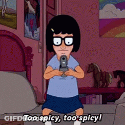 A Cartoon Character Holding A Gun With The Words Too Spicy Too Spicy Below Her GIF