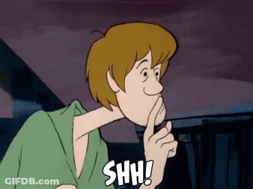 A Cartoon Character Holds His Finger To His Mouth And Says " Shh " GIF