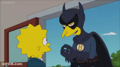 A Cartoon Character In A Batman Costume Is Talking To A Girl GIF