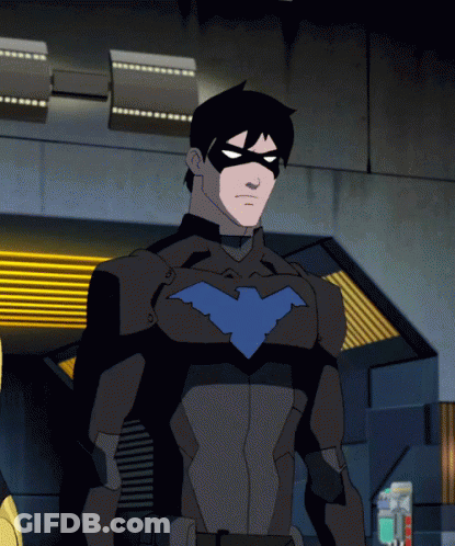 A Cartoon Character In A Batman Suit With A Blue Bird On His Chest GIF