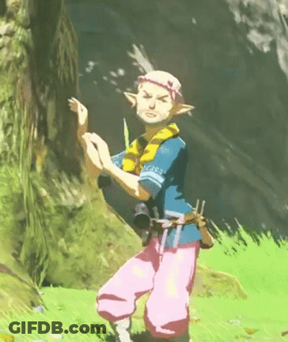 A Cartoon Character In A Blue Shirt And Pink Pants Is Dancing In The Grass . GIF
