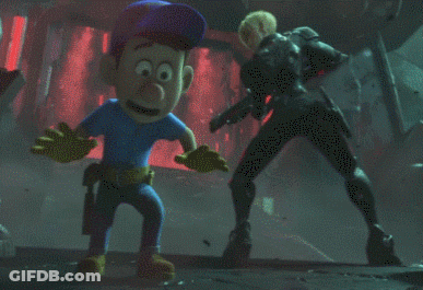 A Cartoon Character In A Blue Shirt Is Standing Next To A Robot GIF
