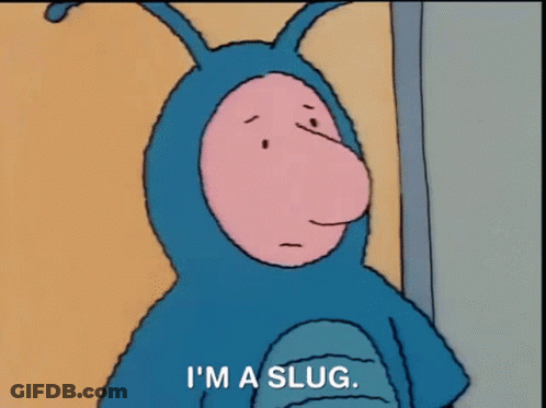 A Cartoon Character In A Blue Slug Costume Says `` I 'M A Slug '' . GIF