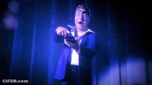 A Cartoon Character In A Blue Suit Is Holding A Cell Phone GIF