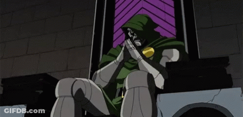 A Cartoon Character In A Green Cape Is Sitting On A Throne . GIF