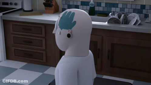 A Cartoon Character In A Kitchen With A Hand Drawn On His Head GIF