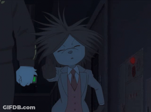 A Cartoon Character In A Suit And Tie Stands Next To A Man GIF