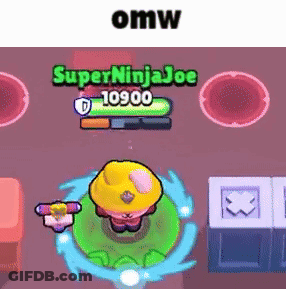 A Cartoon Character In A Yellow Hat Is Standing In A Green Circle In A Video Game . GIF