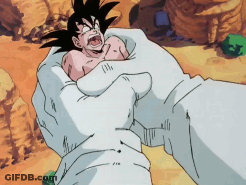 A Cartoon Character Is Being Held In Someone 'S Hands GIF