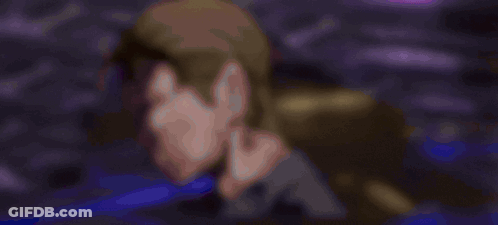 A Cartoon Character Is Chained To A Purple Hat And The Word Clunk Is Above Them GIF