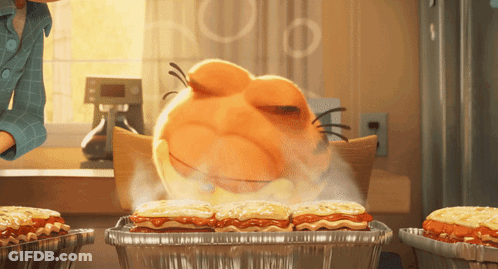 A Cartoon Character Is Cooking A Lasagna In A Tin Foil Pan GIF