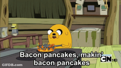 A Cartoon Character Is Cooking Bacon Pancakes On A Stove Top GIF