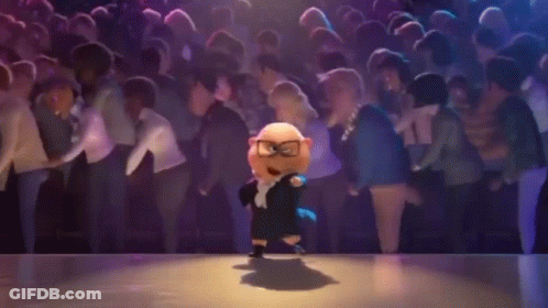 A Cartoon Character Is Dancing On A Stage In Front Of A Crowd . GIF