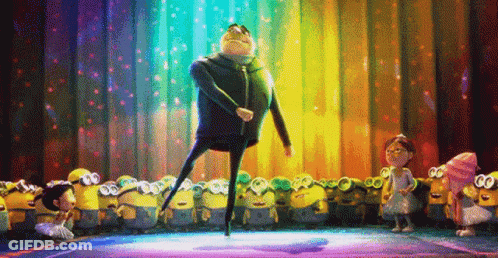 A Cartoon Character Is Dancing On A Stage In Front Of A Group Of Minions . GIF