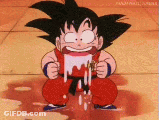 A Cartoon Character Is Drinking From A Puddle Of Liquid . GIF