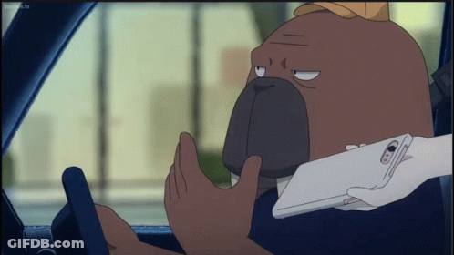 A Cartoon Character Is Driving A Car And Holding A Phone GIF