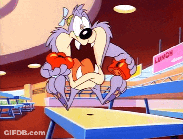 A Cartoon Character Is Eating A Tomato In Front Of A Lunch Sign GIF