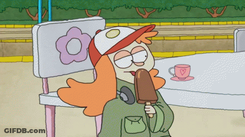 A Cartoon Character Is Eating An Ice Cream Bar While Sitting On A Bench GIF
