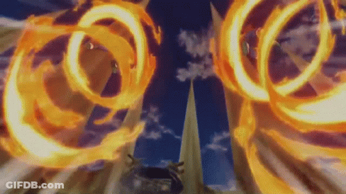 A Cartoon Character Is Flying Through The Air With A Bunch Of Fire Rings Coming Out Of His Mouth . GIF
