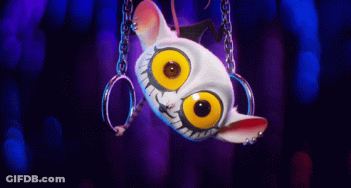 A Cartoon Character Is Hanging Upside Down With Rings Around Its Neck GIF