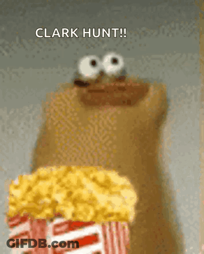 A Cartoon Character Is Holding A Bag Of Popcorn And Saying Clark Hunt . GIF