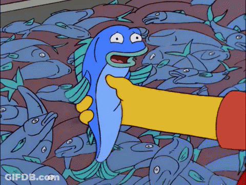 A Cartoon Character Is Holding A Blue Fish In Front Of A Crowd Of Fish GIF