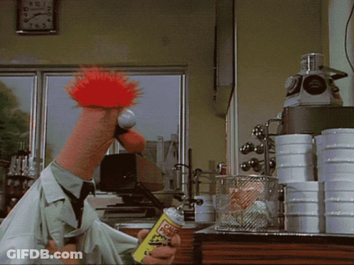 A Cartoon Character Is Holding A Can Of Crude Oil In His Hand GIF