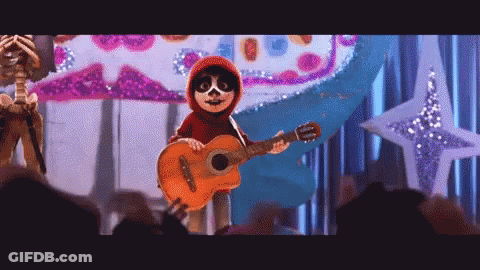 A Cartoon Character Is Holding A Guitar On A Stage . GIF