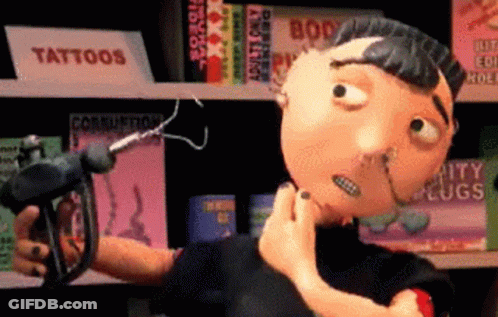 A Cartoon Character Is Holding A Gun In Front Of A Sign That Says Tattoos On It GIF