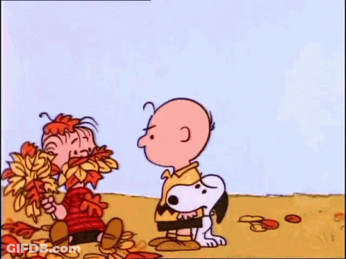 A Cartoon Character Is Holding A Lollipop In A Field . GIF