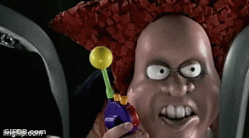 A Cartoon Character Is Holding A Lollipop In His Hand GIF