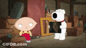 A Cartoon Character Is Holding A Picture Of A Man GIF