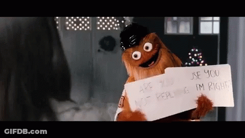 A Cartoon Character Is Holding A Sign That Says " Are You Using Me Right " GIF