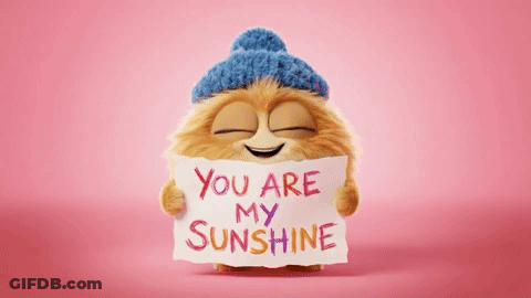 A Cartoon Character Is Holding A Sign That Says You Are My Sunshine GIF