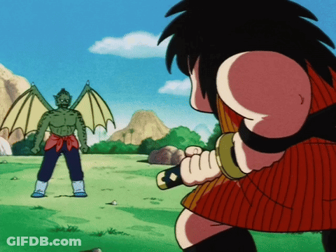 A Cartoon Character Is Holding A Sword In Front Of A Dragon GIF