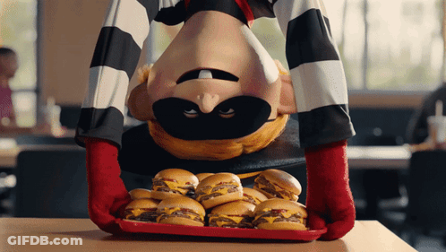 A Cartoon Character Is Holding A Tray Of Cheeseburgers GIF