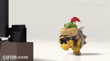 Cartoon Character Holding Video Game Controller In Front Of TV GIF