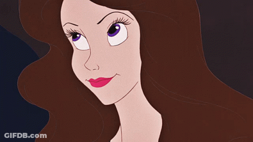 A Cartoon Character Is Holding A Yellow Pendant In Her Hand GIF