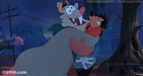 A Cartoon Character Is Holding Another Cartoon Character In His Arms GIF