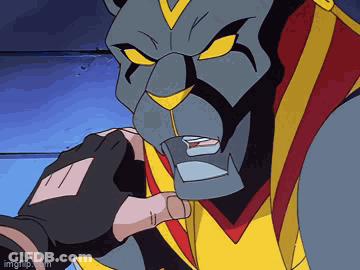 A Cartoon Character Is Holding Someone 'S Hand In Front Of His Face GIF