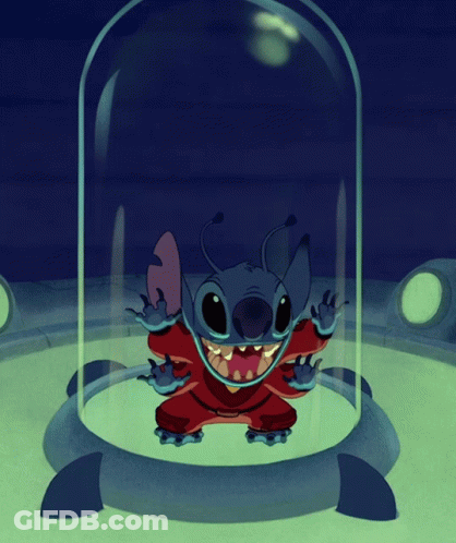 A Cartoon Character Is In A Glass Dome With Its Mouth Wide Open GIF