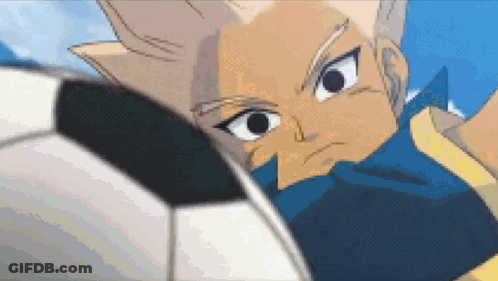 A Cartoon Character Is Kicking A Soccer Ball In The Air . GIF