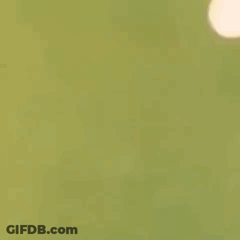A Cartoon Character Is Kicking A Soccer Ball In The Air . GIF