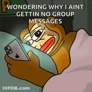 A Cartoon Character Is Laying In Bed Looking At His Phone . GIF