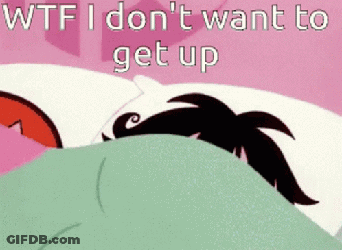A Cartoon Character Is Laying In Bed With The Words " Wtf I Don 'T Want To Get Up " GIF