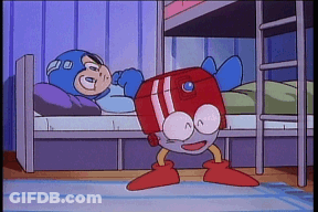 A Cartoon Character Is Laying On A Bed Next To A Robot GIF