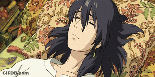 A Cartoon Character Is Laying On A Couch With A Floral Pillow GIF