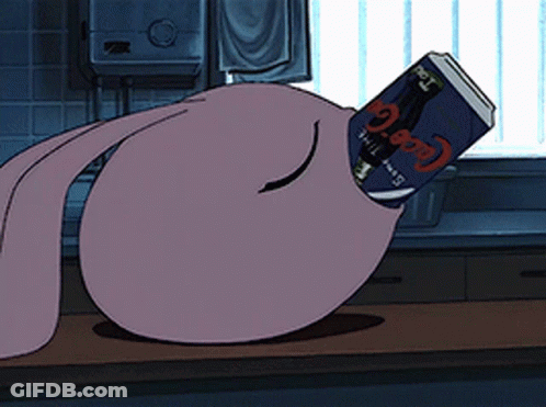 A Cartoon Character Is Laying On A Table With A Can Of Coca Cola In His Hand GIF