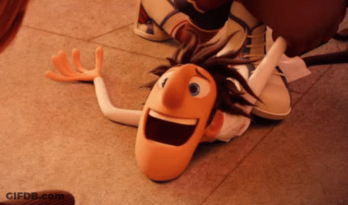 A Cartoon Character Is Laying On The Floor With His Mouth Open And Arms Outstretched . GIF